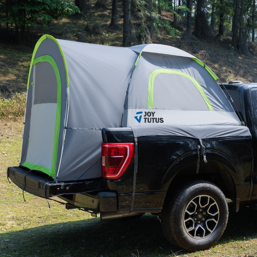 JOYTUTUS truck tent with rainfly provides rain protection for gear outdoors