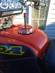 JRL tank cap cover mounted on Honda CRF showcases secure fit and protection