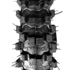 Julymoda 80/100-12 tire mounted on rear wheel for dirt track riding.