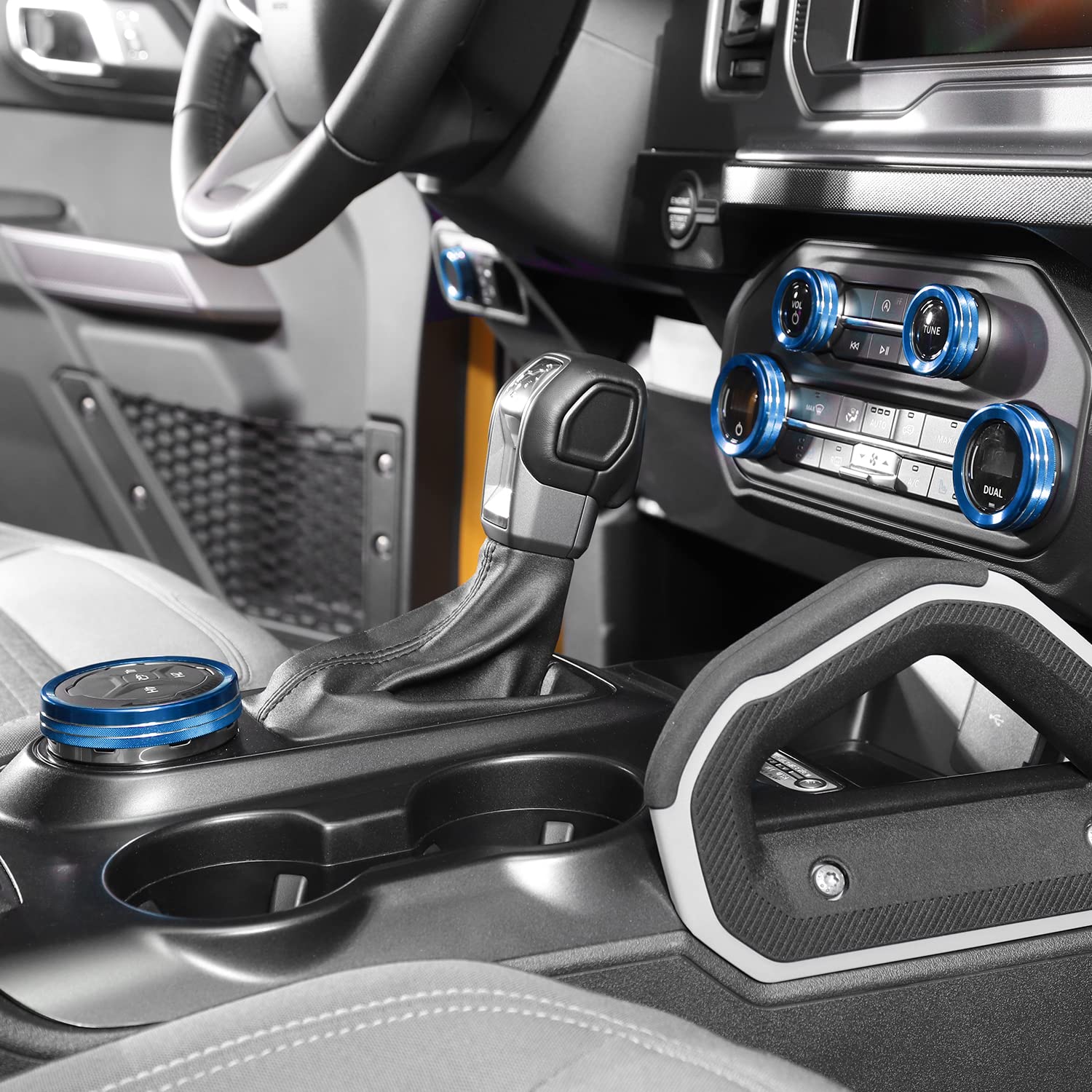 JWWY Bronco blue audio switch knob shields wear on dials.