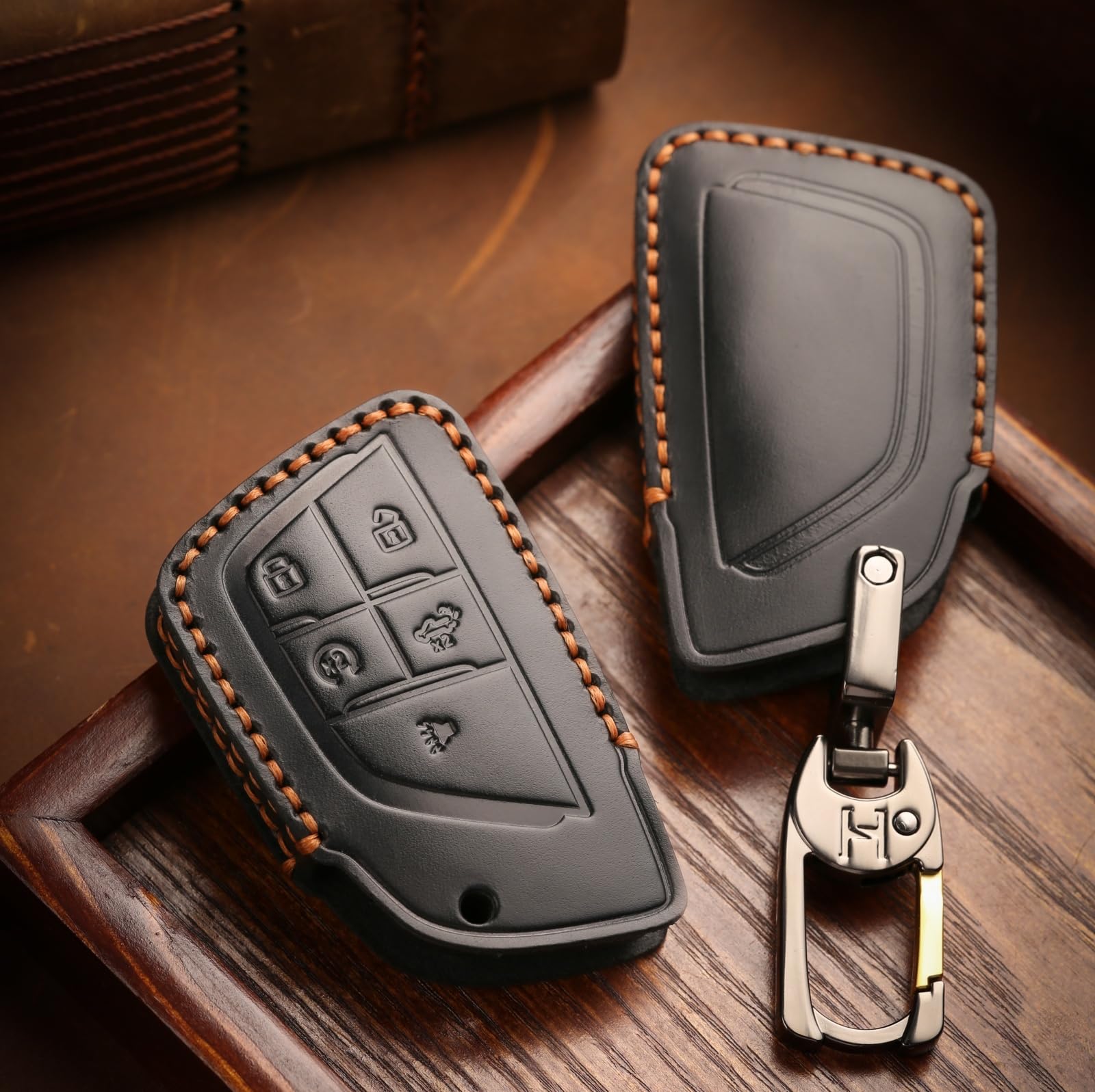 Close-up of KEAIKE top-grain leather texture on key fob cover.
