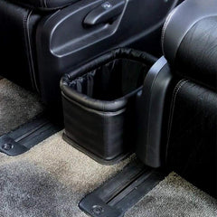 KINGBERWI leather car trash can fits neatly in a car corner for organized space