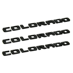 KINGBOO Colorado fender badge in gloss black 3D emblem for durable truck styling.
