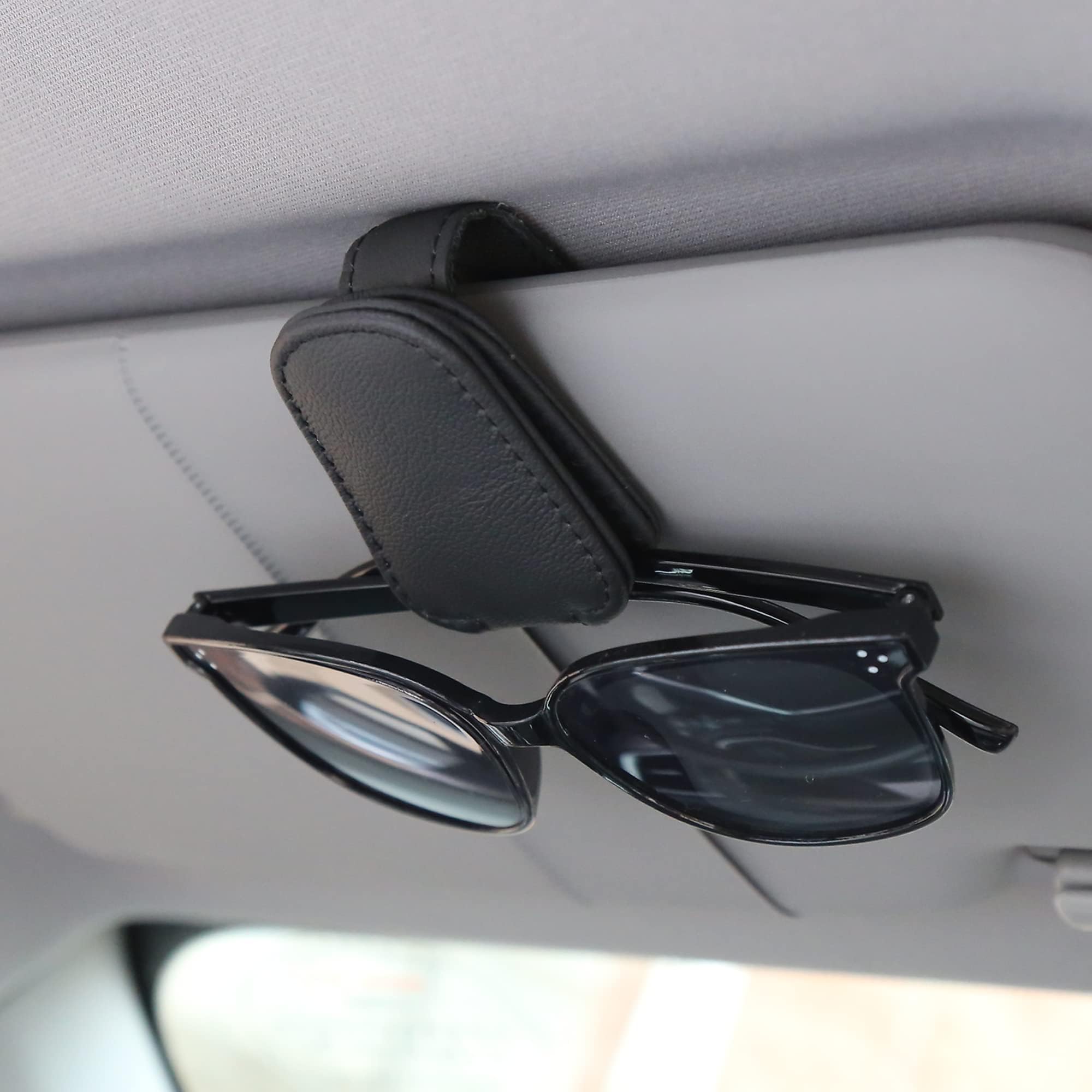KIWEN sunglasses holder on car visor with magnetic leather clip securely holds eyewear