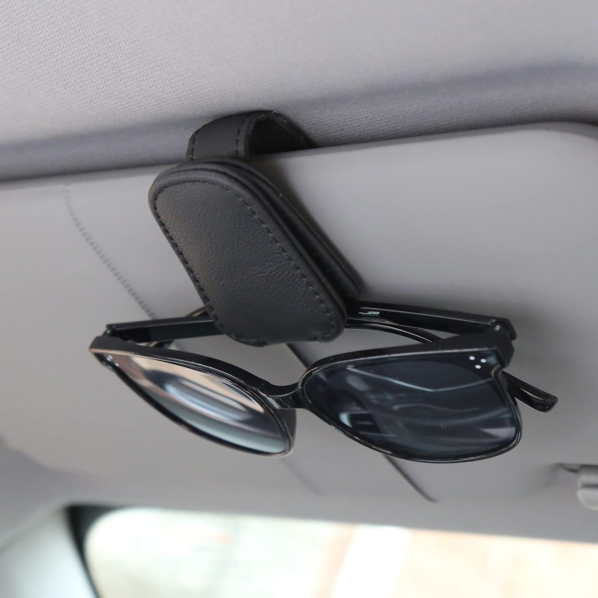 KIWEN sunglasses holder on car visor with magnetic leather clip securely holds eyewear