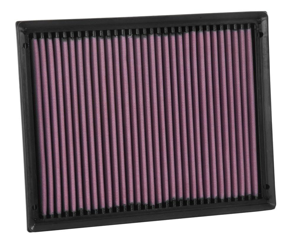 Hands installing a K&N filter as a simple drop-in replacement.