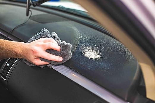 Result shows a refreshed dashboard plastic finish after applying KOCHCHEMIE Refresh Cockpit Care.