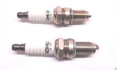 Kohler spark plug 12mm RFI pack close-up for reliable ignition in outdoor equipment.