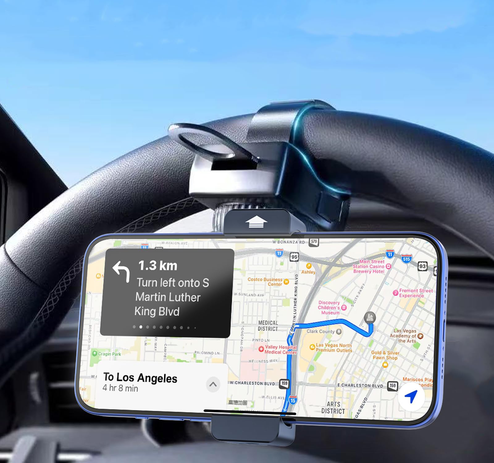 Kolasels steering wheel phone holder with metal clip for secure grip.