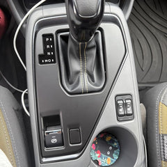 Kolya center console gear shift cover on Crosstrek enhances interior style and protection.