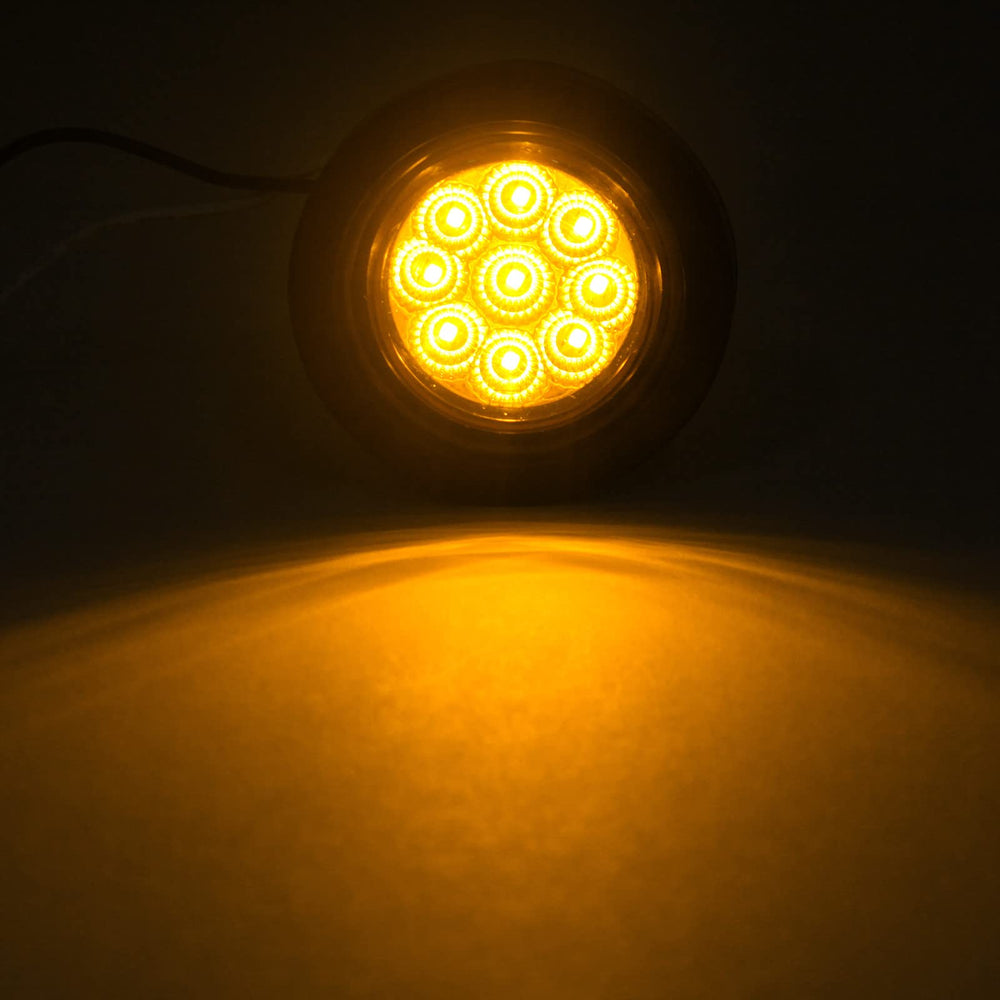 Konrali round LED marker light with grommet for flush mounting.