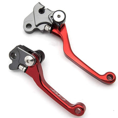 Krace brake lever folding pivot close-up—crash-resilient design.