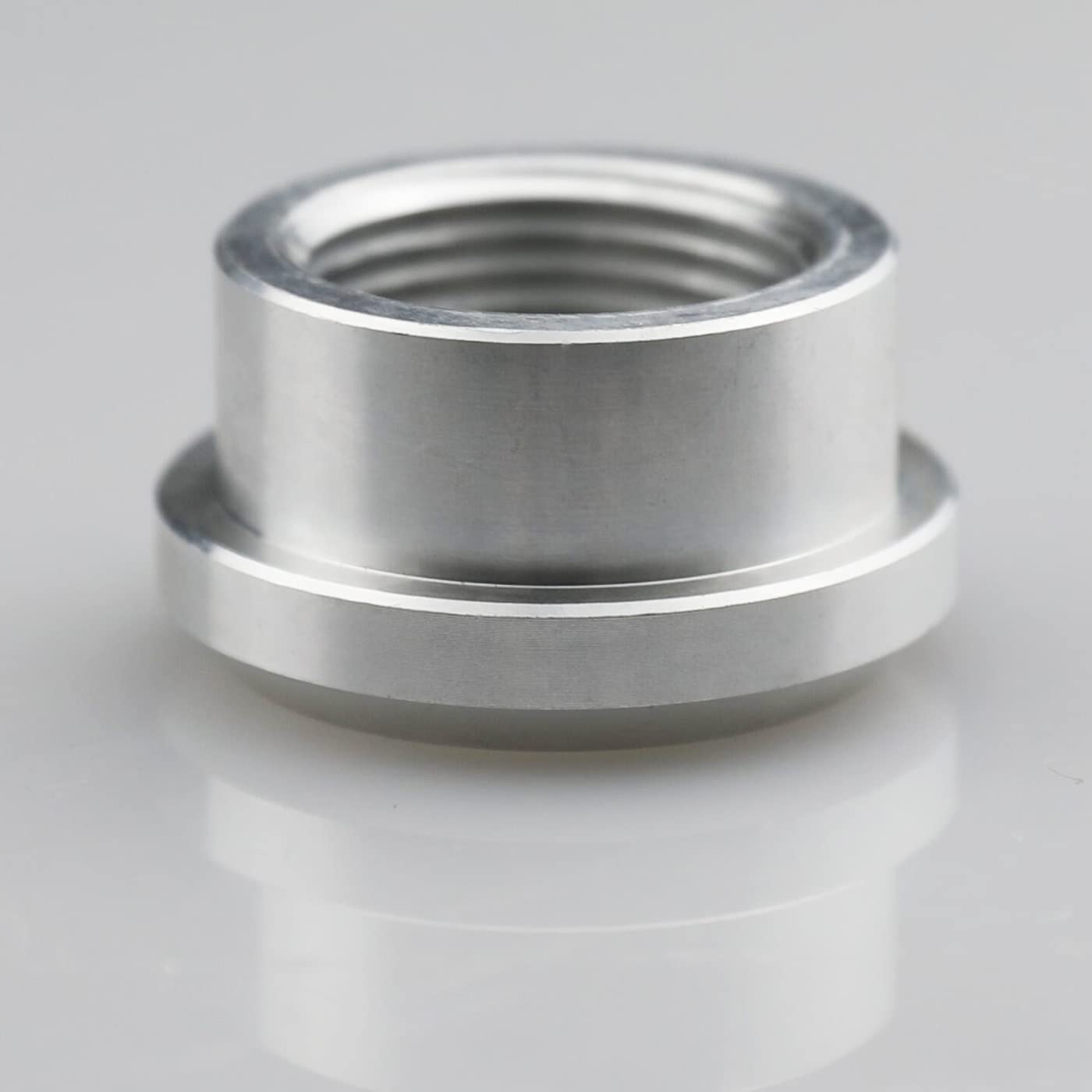 KRD PERFORMANCE aluminum billet bung with natural finish, ideal for automotive applications and fittings.