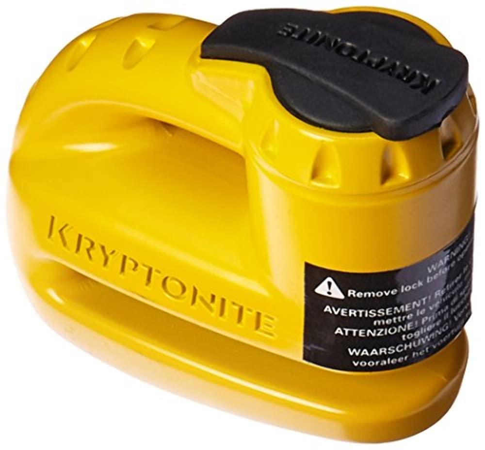 Kryptonite Keeper 5s yellow disc lock securing a vehicle against roll-away theft.