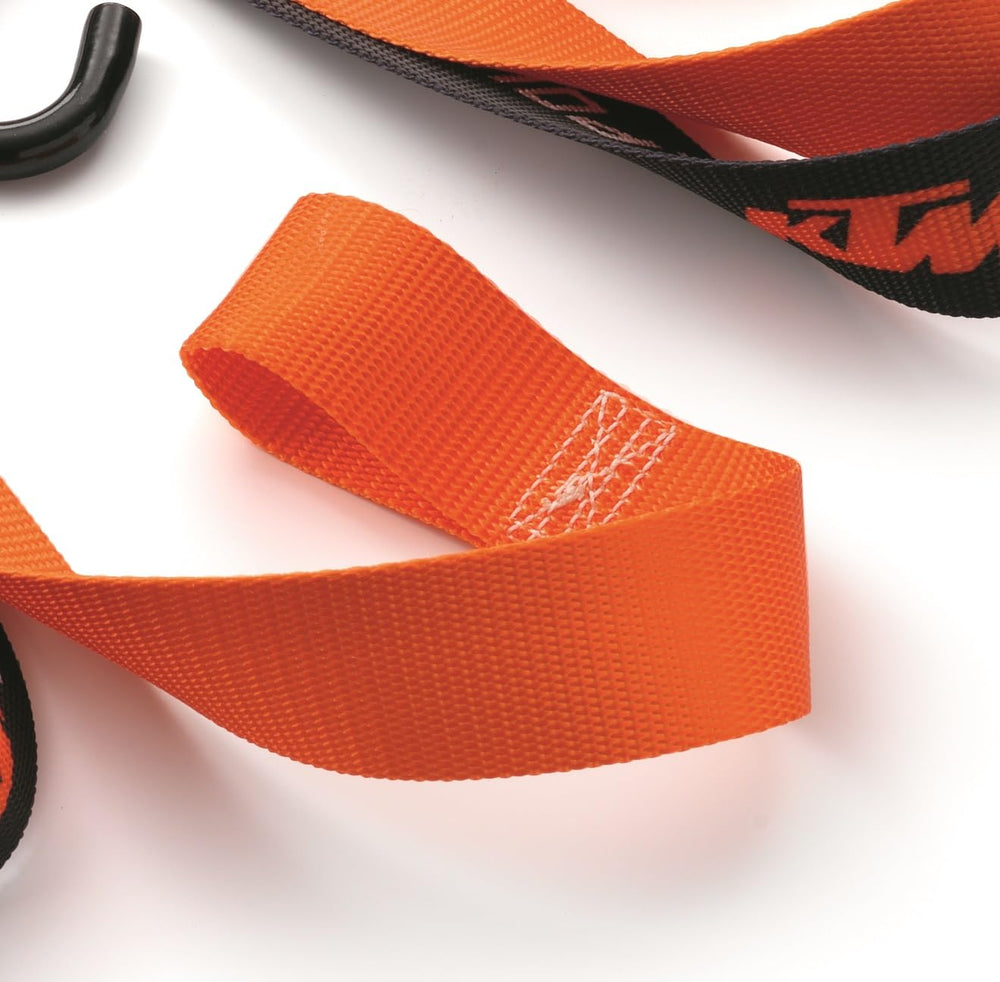 Close-up of 1.5 inch strap on KTM tie down set highlighting durability.