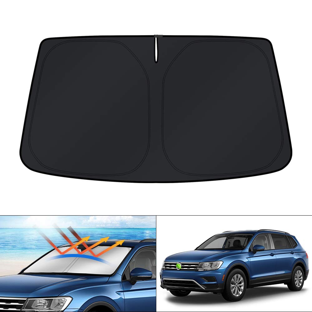 KUST windshield shade on VW Tiguan, precise fit covering windshield for reduced glare and heat