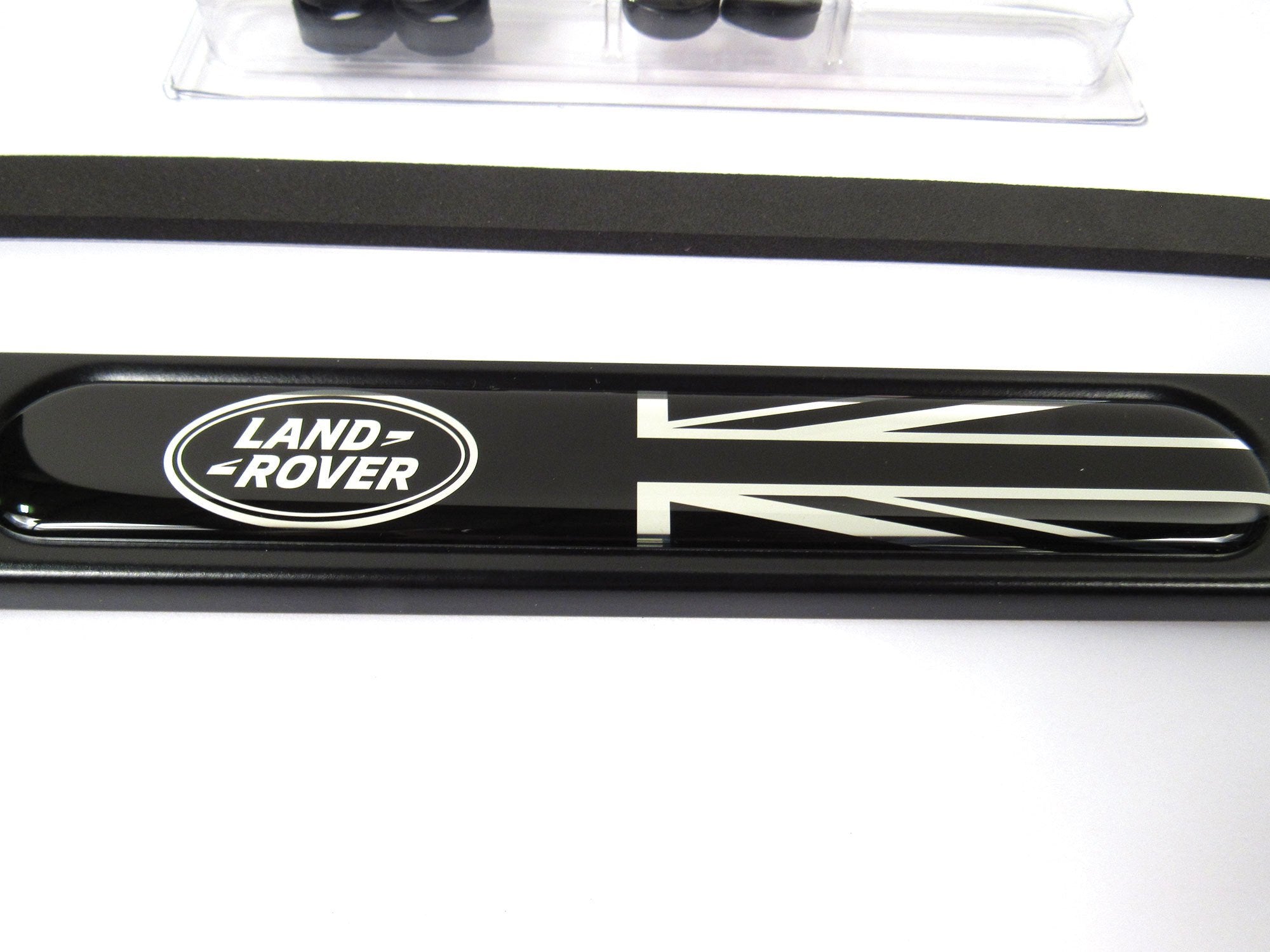 Land Rover license frame matte black mounted on vehicle for a polished look.