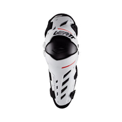 Leatt knee guards worn on bike illustrate comfortable, protective fit during pedaling and riding.