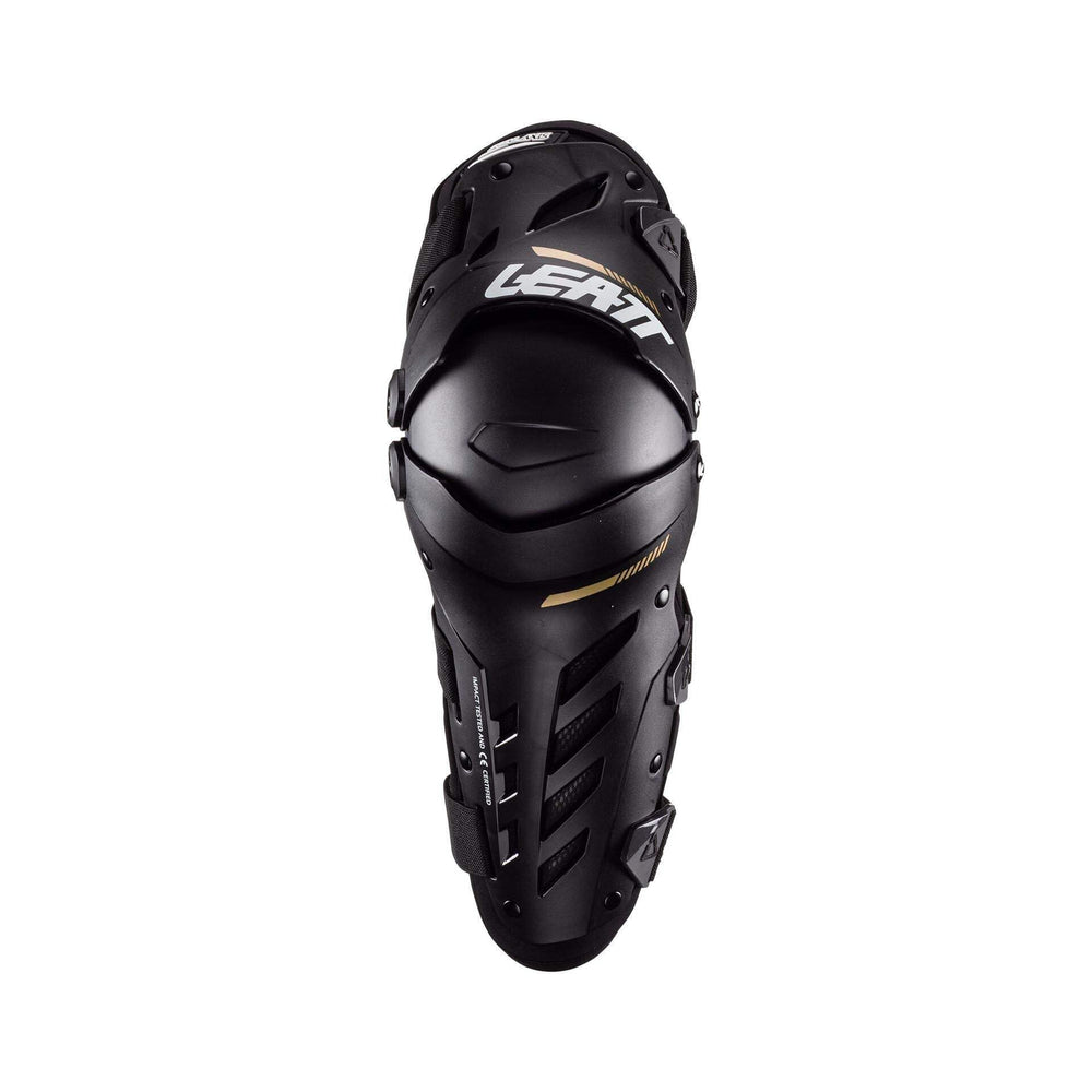 Leatt Knee Guards white on-bike, action shot, ready for dynamic mountain biking.