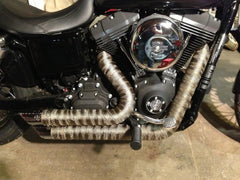 LEDAUT exhaust wrap applied to a pipe showing heat management in action.