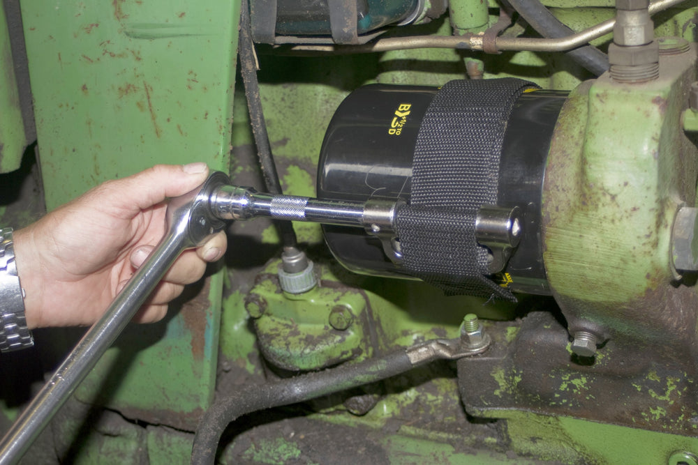 Close-up of Lisle 60200 heat-treated alloy steel yoke for durability.