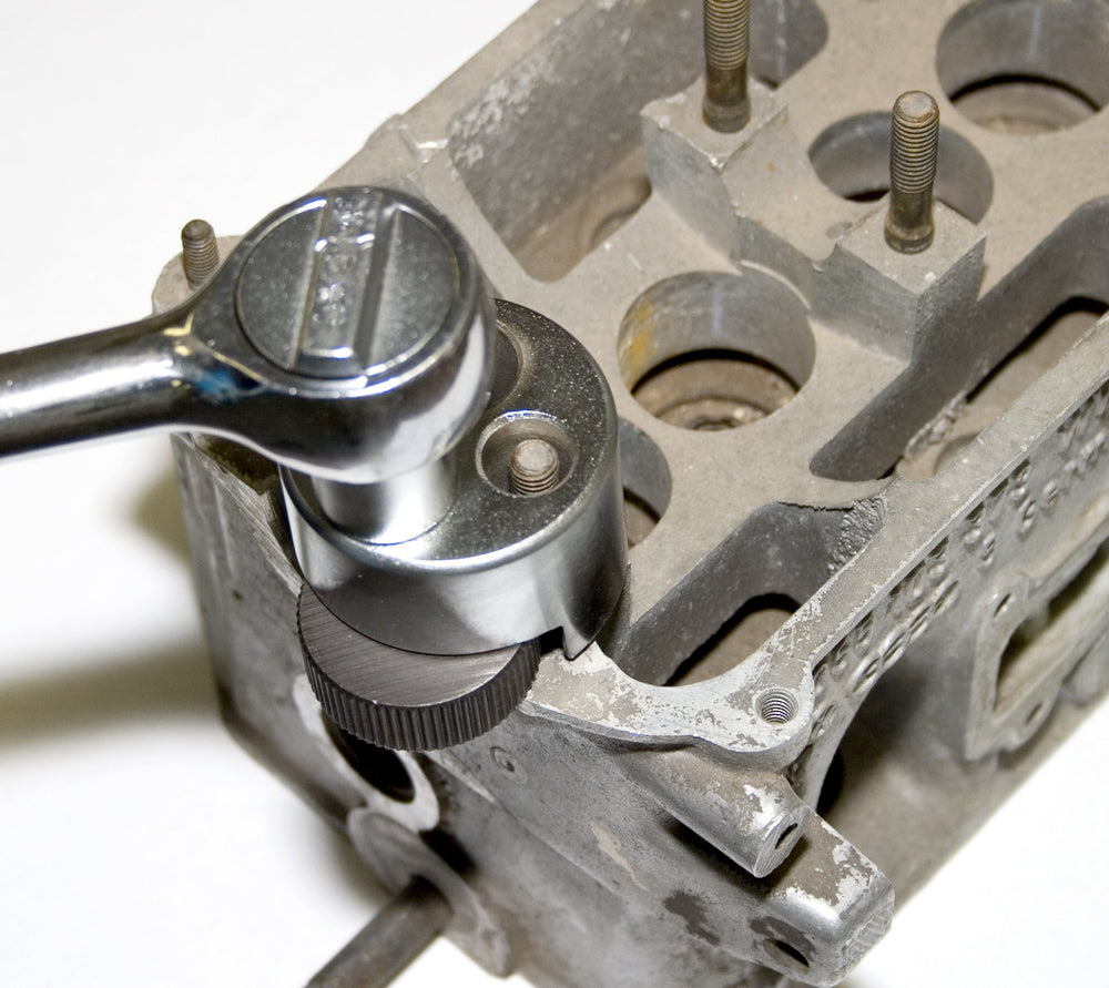 Lisle 71200 Stud Remover in use, grips flush to surface.