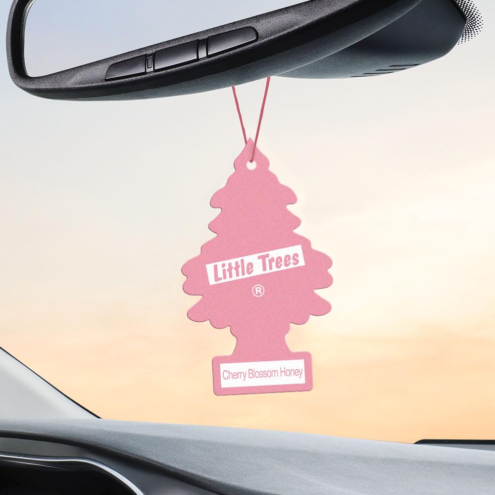LITTLE TREES Cherry Blossom car interior with 24-count packaging visible, lasting fragrance.