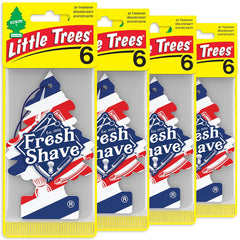 Little Trees Fresh Shave hanging tree in car, delivering long-lasting scent during commutes.