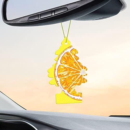 Little Trees in-car air freshener shown in vehicle interior for long-lasting scent.