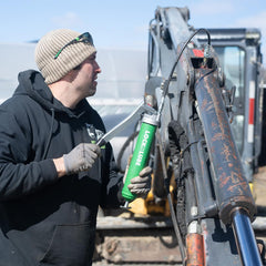 LockNLube grease gun with 20-inch hose offers extended reach