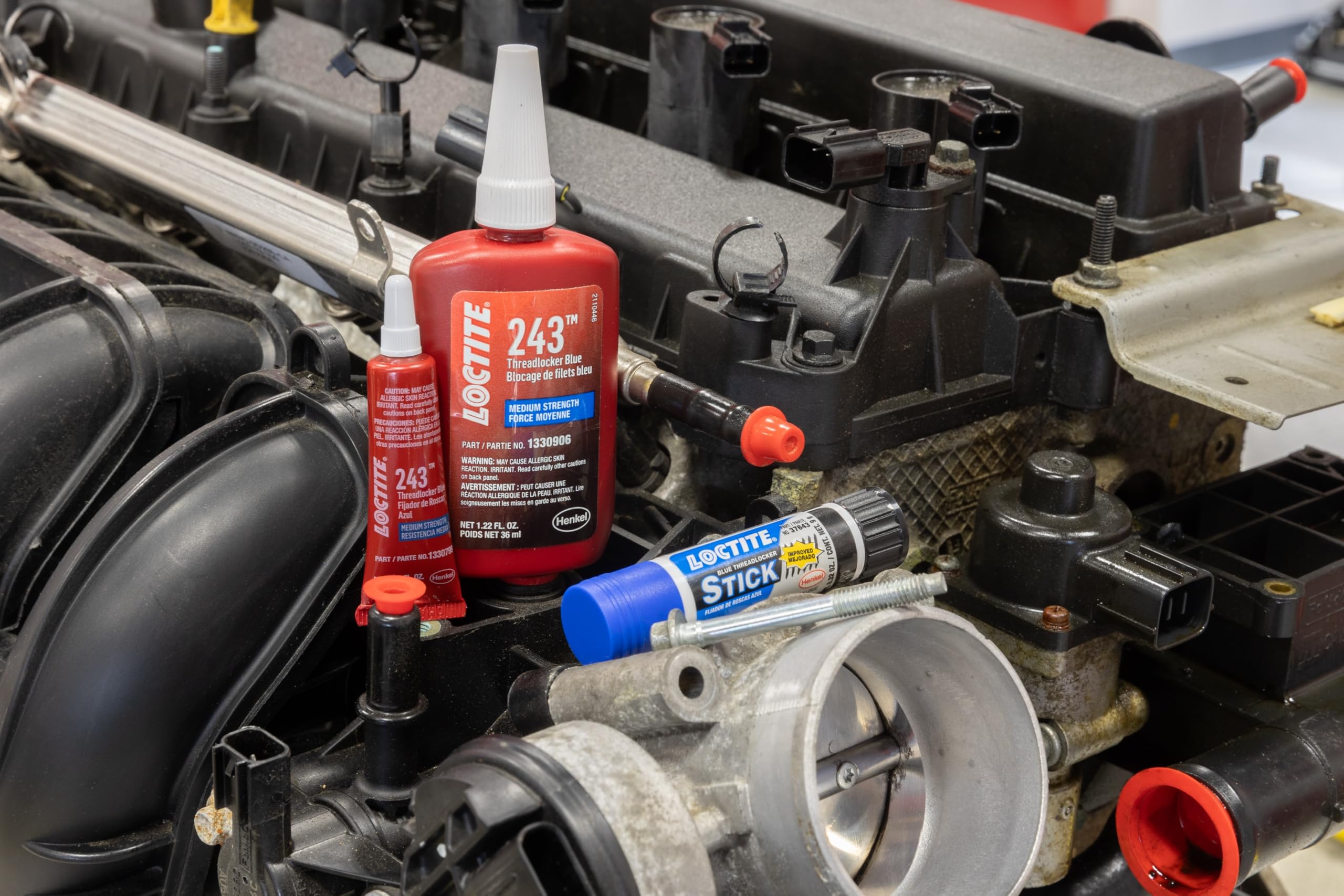 Oil pan fastener sealed by Loctite 243 under challenging conditions.