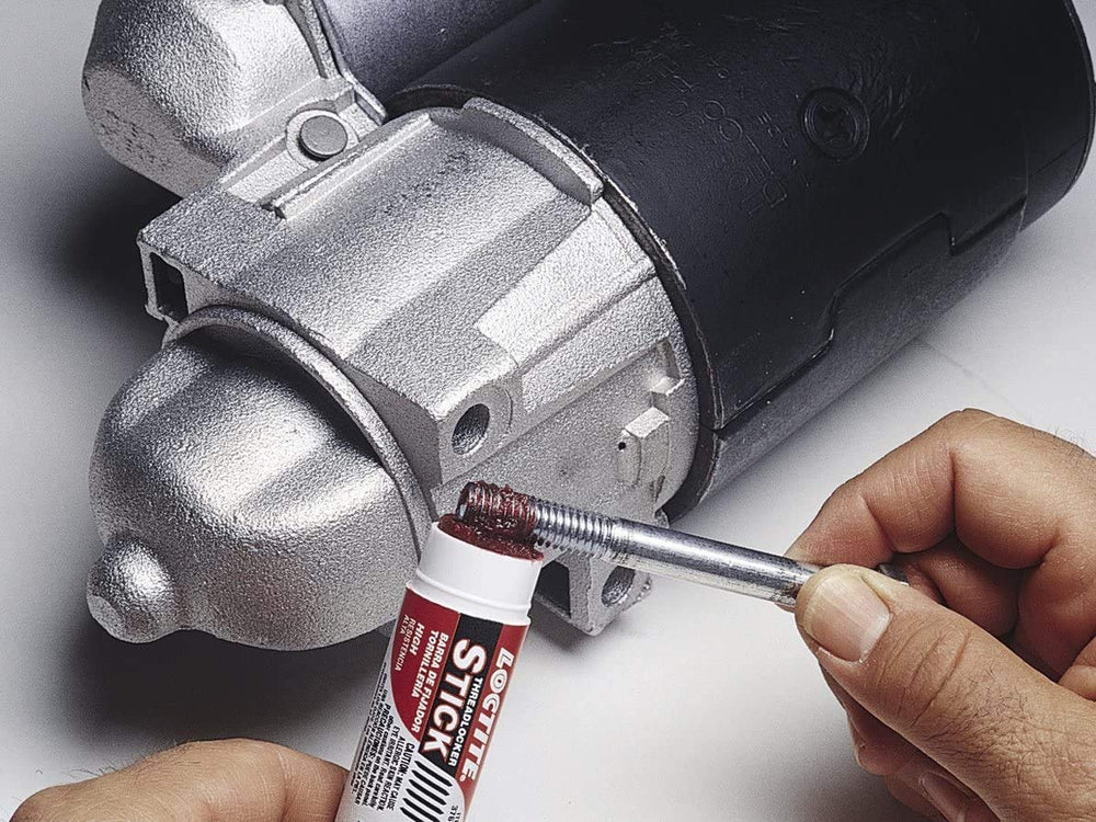 Loctite Red threadlocker stick packaging suited for heavy-duty automotive jobs.