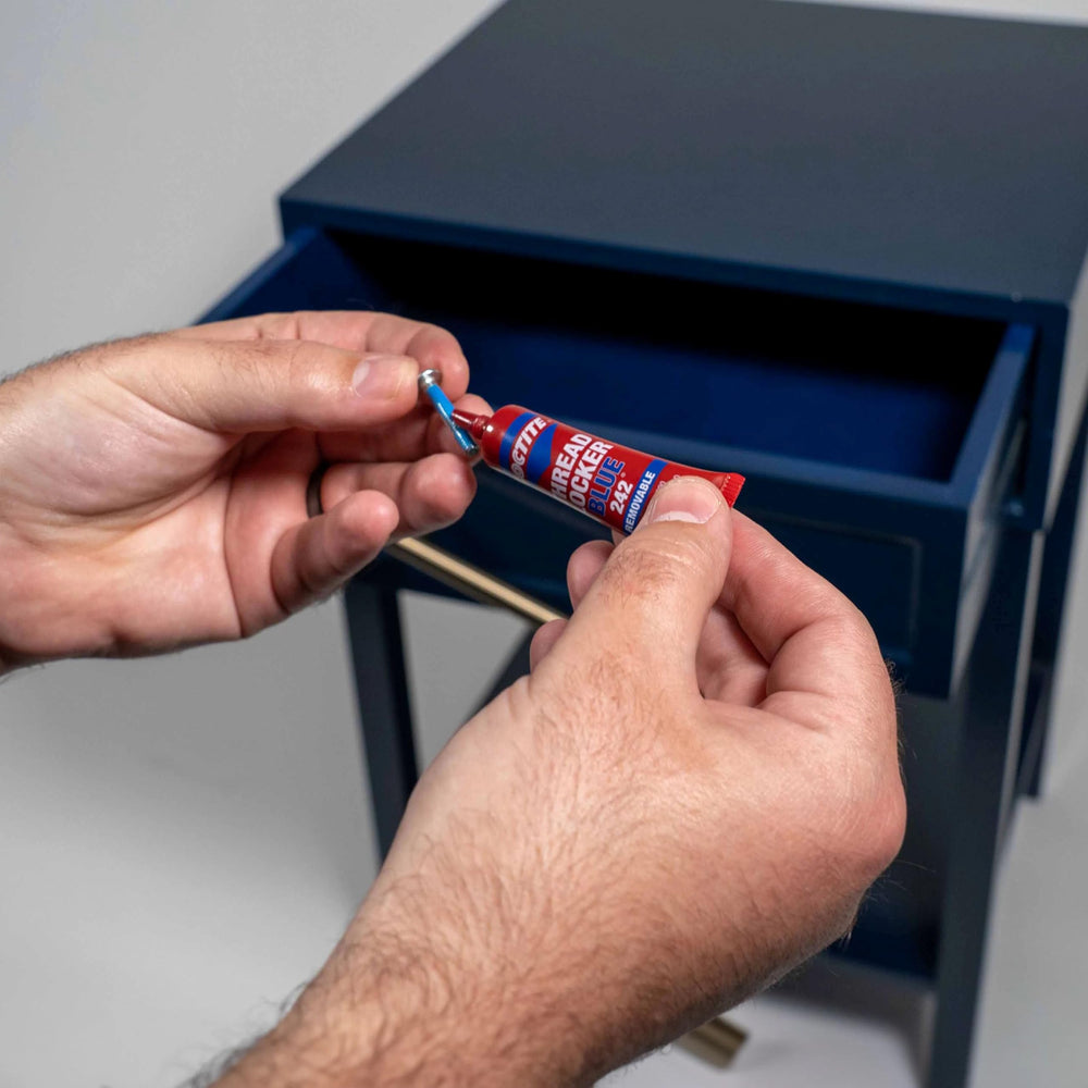 Packaging box showing Loctite Blue 242 6 ml bottle in a 12-pack.