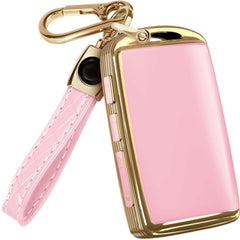 Lucrum Mazda key fob cover in pink and black adds style and protective grip.