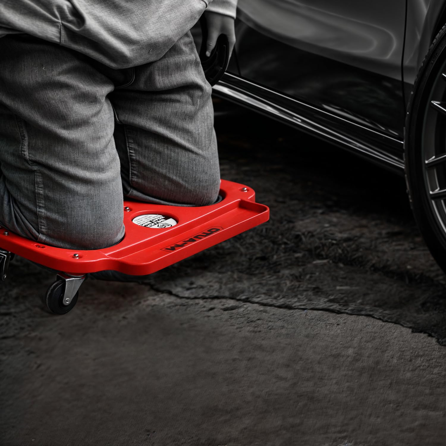 M-AUTO rolling knee creeper tool tray provides handy storage for small parts.