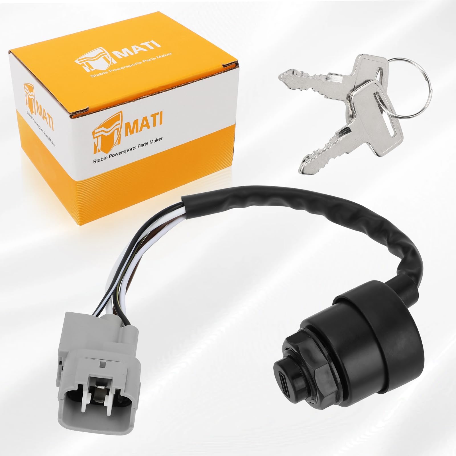 M MATI ignition key switch with key in insert view showing turn-to-start action.