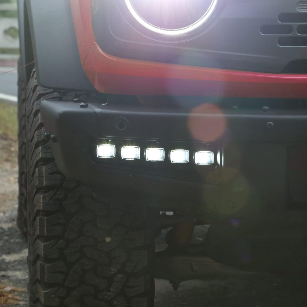 Mabett fog light assembly packaged kit ready for install on Bronco.