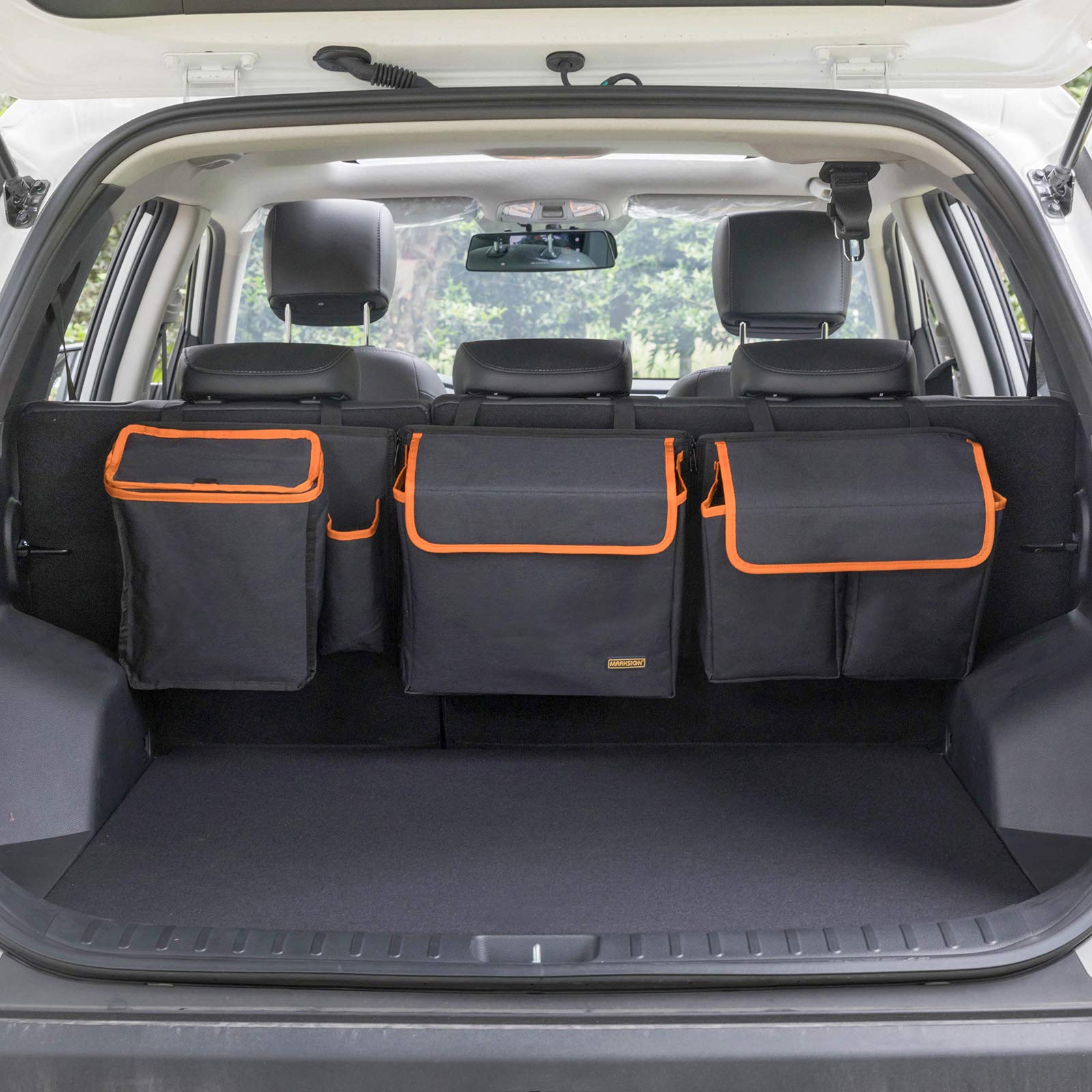 MARKSIGN Deluxe trunk organizer installed behind the backseat for quick access.