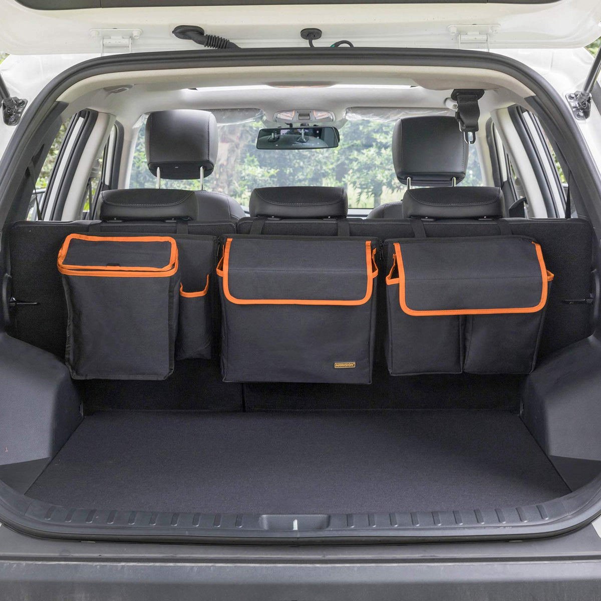 MARKSIGN Deluxe trunk organizer installed behind the backseat for quick access.