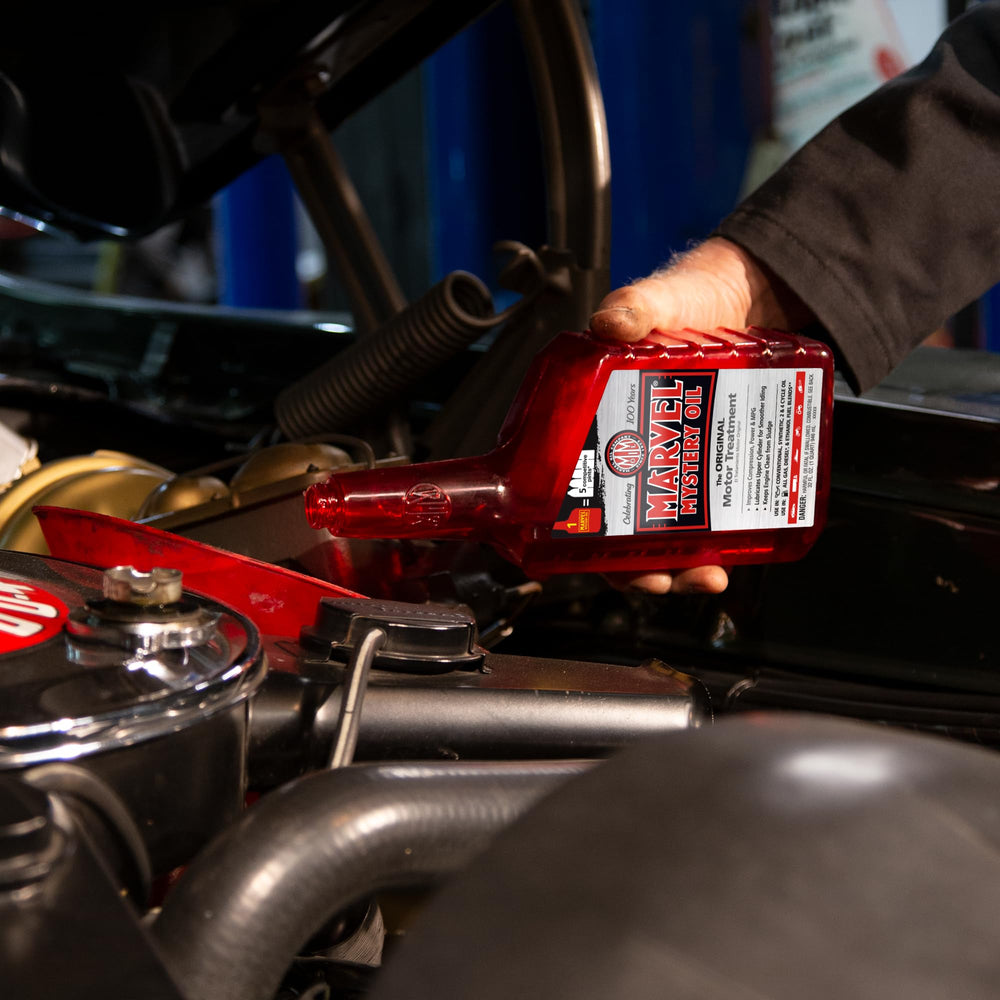 Marvel Mystery Oil application spreading lubricating film for reduced wear.