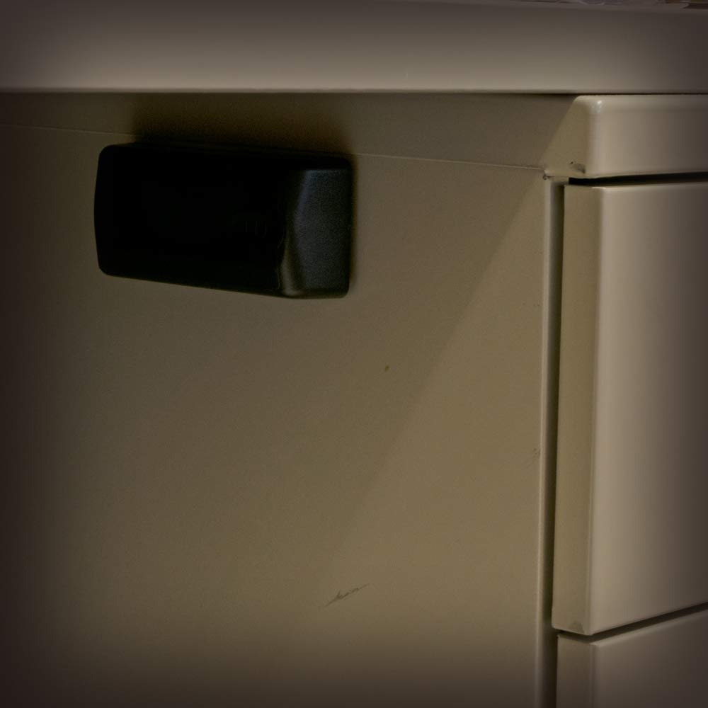 Rust-free plastic Master Lock key holder shown in a compact, discreet design