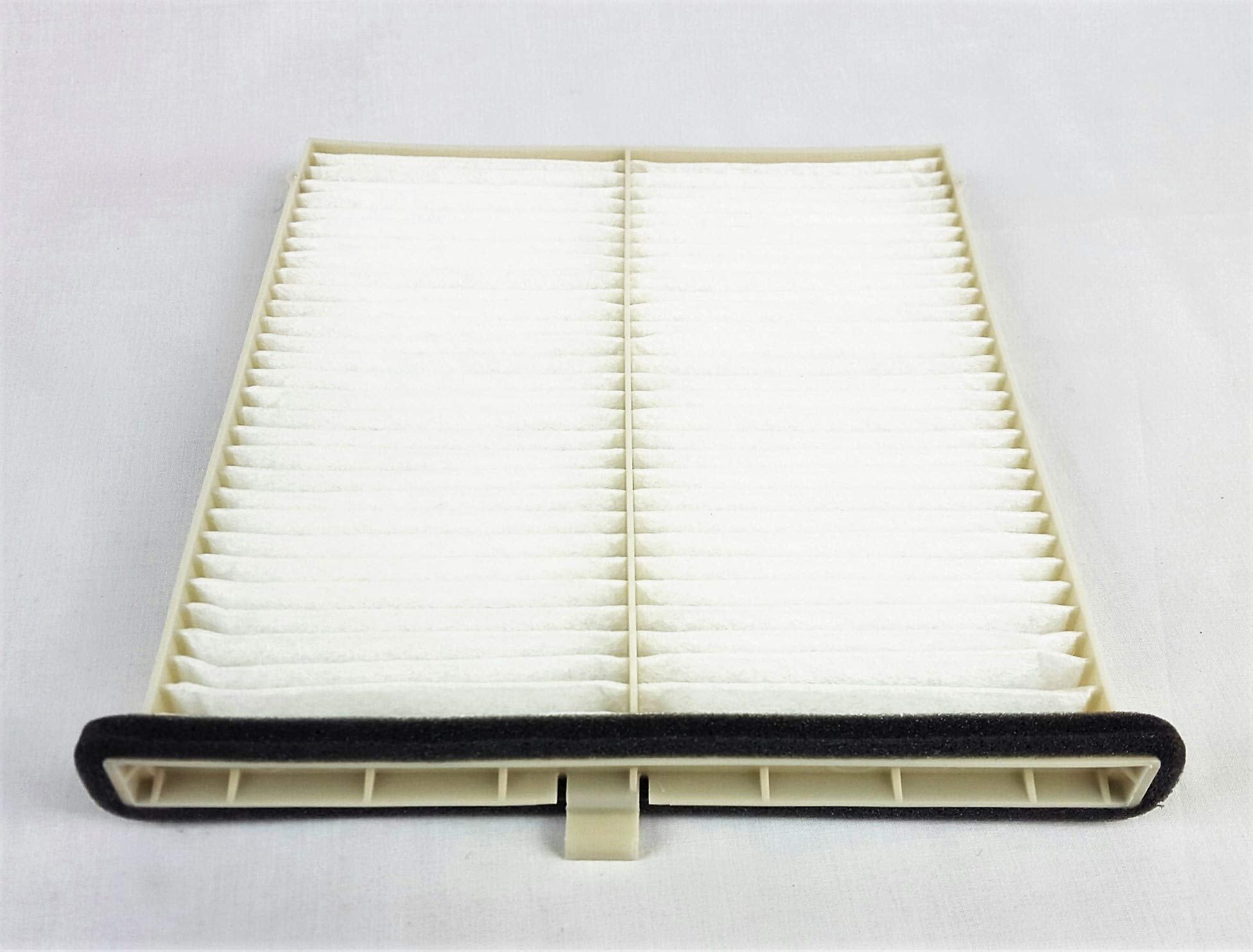Closeup of Mazda cabin air filter pleats highlighting filtration surface