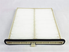 Closeup of Mazda cabin air filter pleats highlighting filtration surface