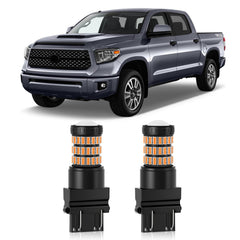 MEALAM Amber Yellow LED bulb with front projector for Toyota Tundra turn signals.