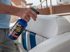 Meguiar's cleaner removing fiberglass streaks on a boat surface