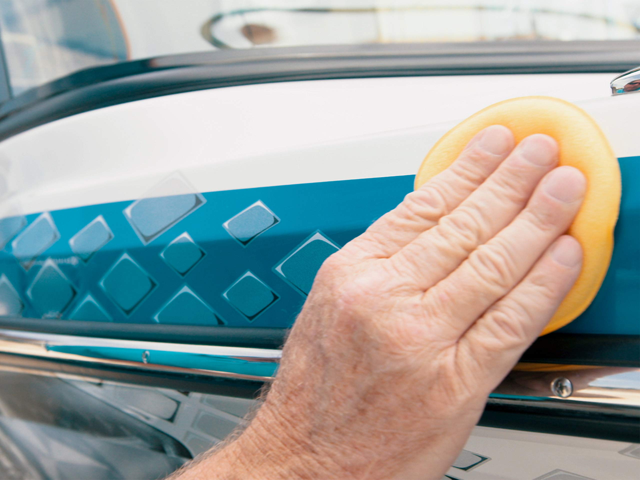 Meguiar's Flagship Premium Marine Wax on fiberglass shows durable surface protection.