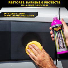 Meguiar's restorer applied with wipe for restored darkness on faded bumper plastics.