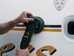 Buffed Meguiar's Marine/RV Wax for durable protection on fiberglass surfaces.