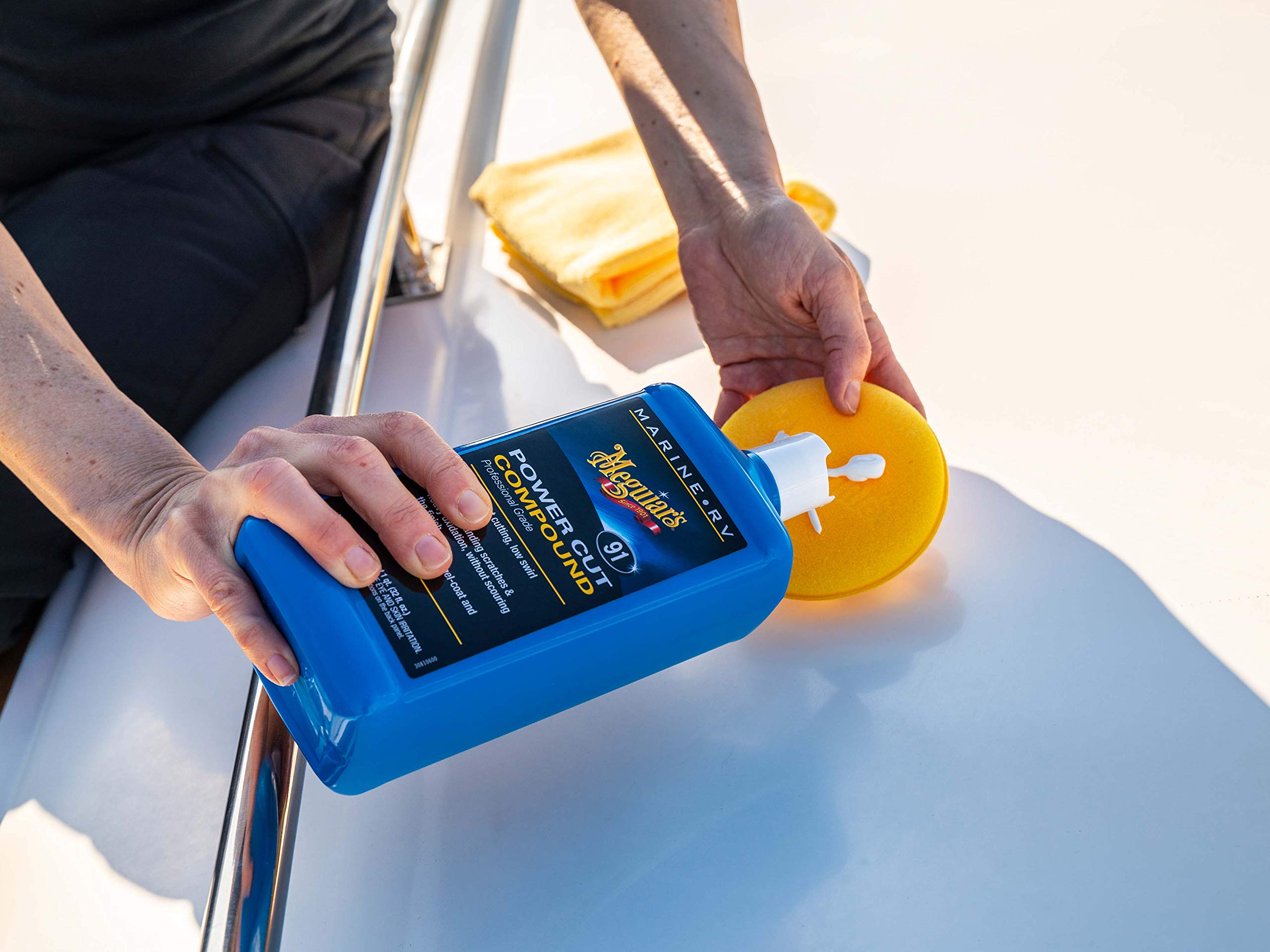 Meguiar's Marine/RV Power Cut Compound applied to fiberglass gel coat reducing swirl.