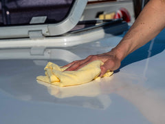 Meguiar's Marine/RV Power Cut Compound finish enhances gloss for sealant prep.
